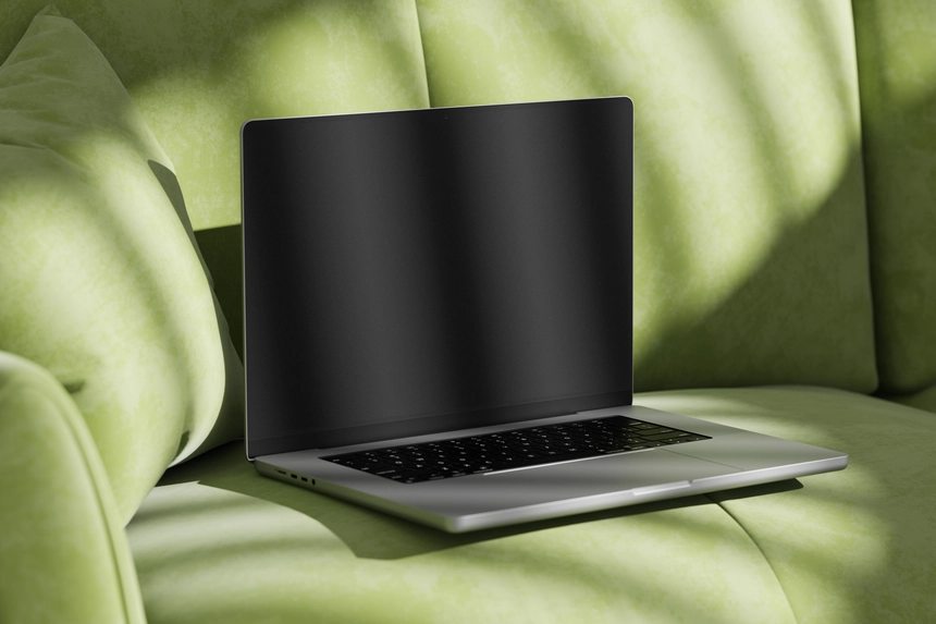 Perspective View of Free Macbook Pro Mockup on Sofa Modern Free Macbook Pro Mockup on Sofa for Stunning UI UX Design
