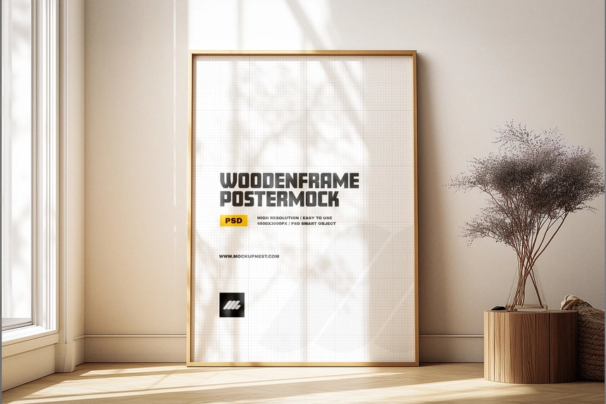 Free Wooden A2 Poster Frame Mockup in Sunlit Minimal Room Free Wooden A2 Poster Frame Mockup in Sunlit Minimal Room