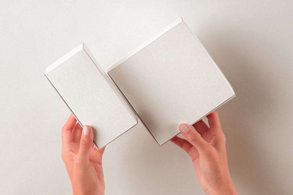Free Hands Holding Product Box PSD Mockup Set