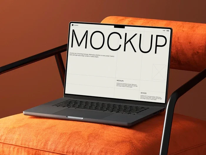 Free Macbook Mockup on Orange Chair