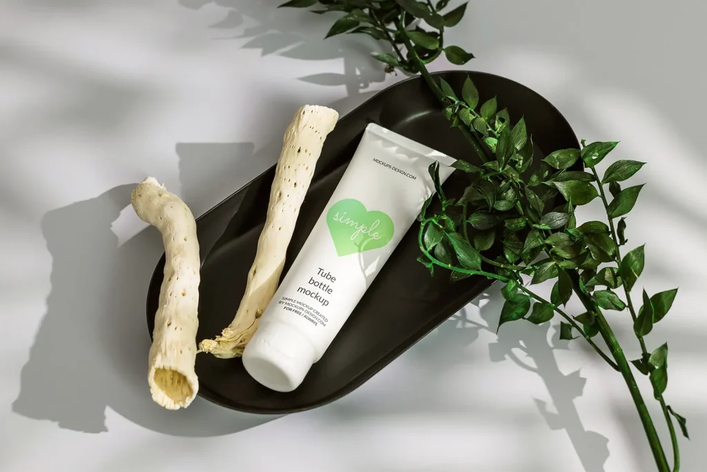 Free Cosmetic tube in black tray mockup