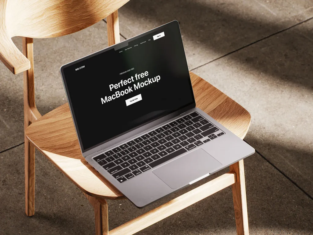 MacBook mockup on wooden chair