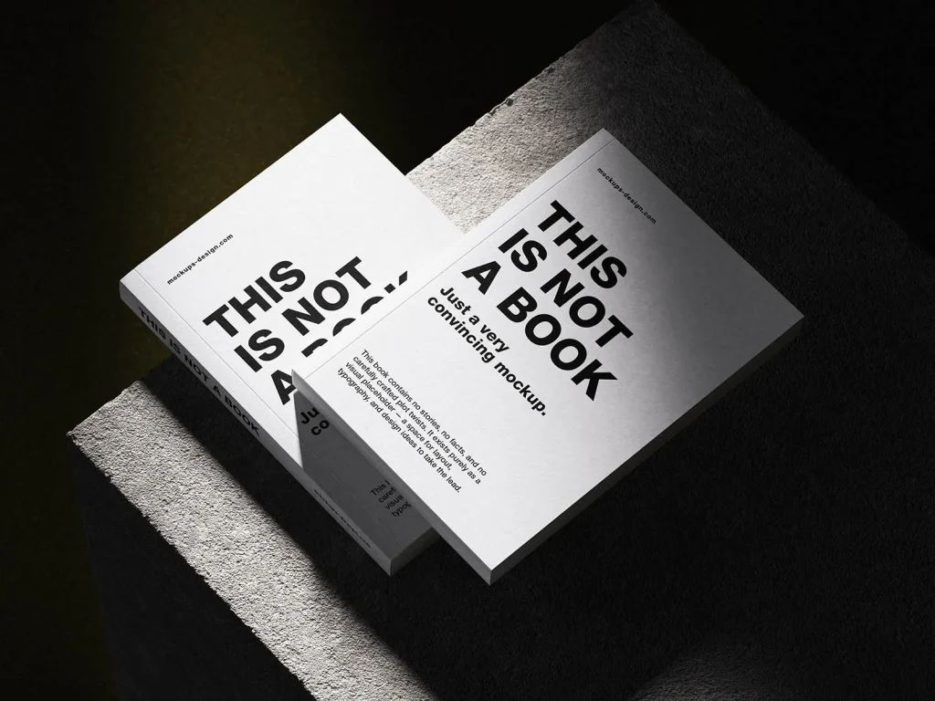 Softcover book on concrete mockup