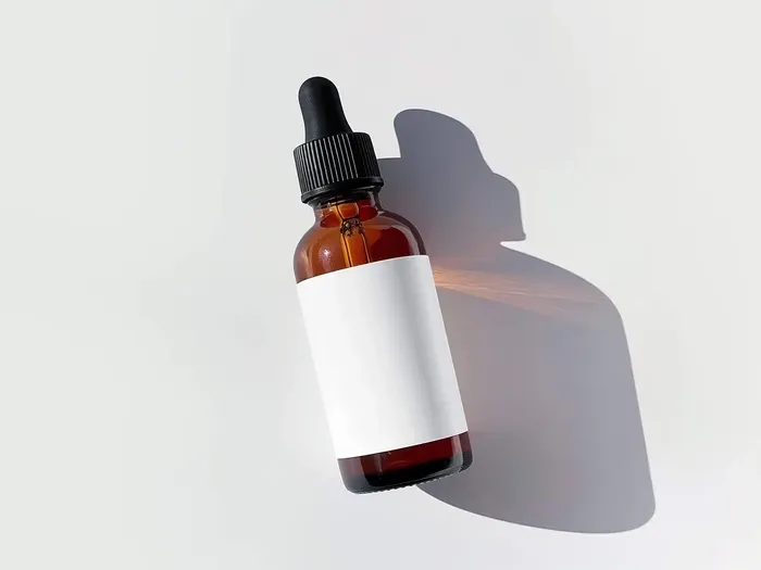 Elegant Glass Dropper Bottle Mockup for Cosmetic and Product Design